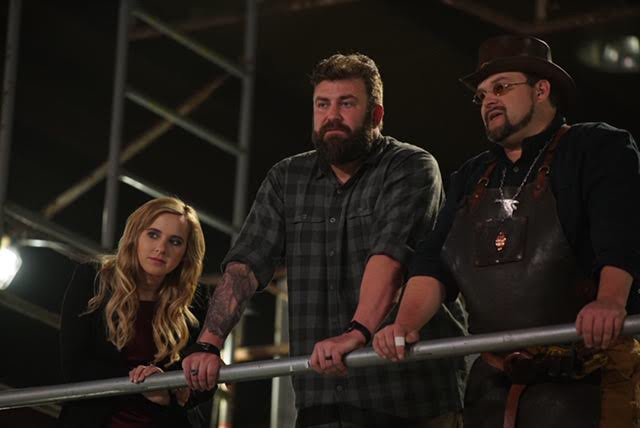Ashley Hlebinsky, Zeke Stout, and Trenton Tye watching contestants compete on Master of Arms. Courtesy of Discovery.