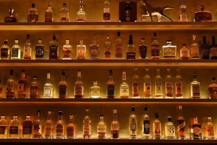 The shelves at Maysville hold over 150 whiskies. Credit Maysville NYC.