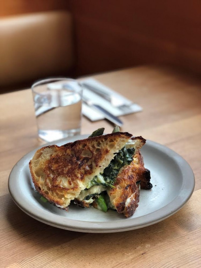 Tartine Manufactory Grilled Cheese Sandwich with Cowgirl Creamery Wagon Wheel, Mornay, Asparagus, Mint, Fava Greens & Spring Onions on Tartine Country Bread. Tartine Manufactory Grilled Cheese Sandwich with Cowgirl Creamery Wagon Wheel, Mornay, Asparagus, Mint, Fava Greens & Spring Onions on Tartine Country Bread.