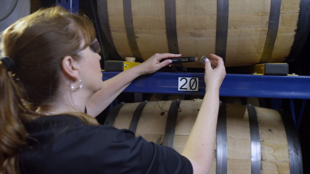 Andrea Wilson inspects barrels