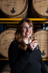 Andrea Wilson drinking Michter's bourbon